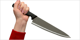 Hand wields knife